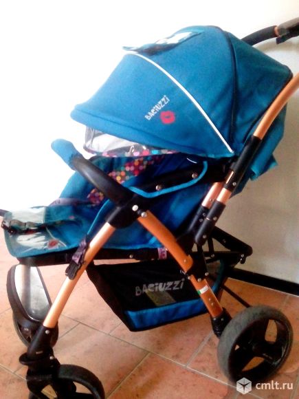 Прогулочная коляска Baciuzzi с перекидной ручкой. Фото 1.
