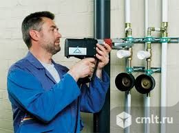 Сантехники-монтажники. Фото 1.