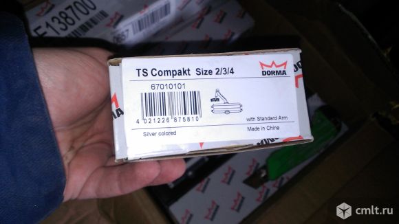 Дверной доводчик  DORMA. Фото 1.