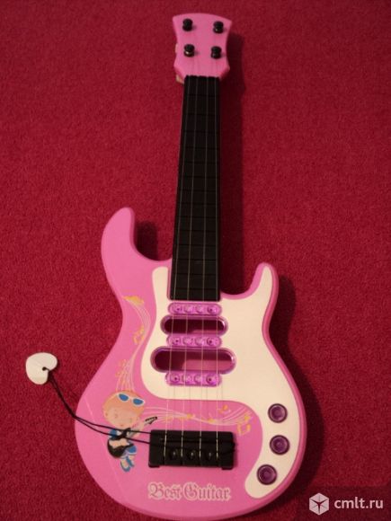 Гитара игрушечная. Фото 1.