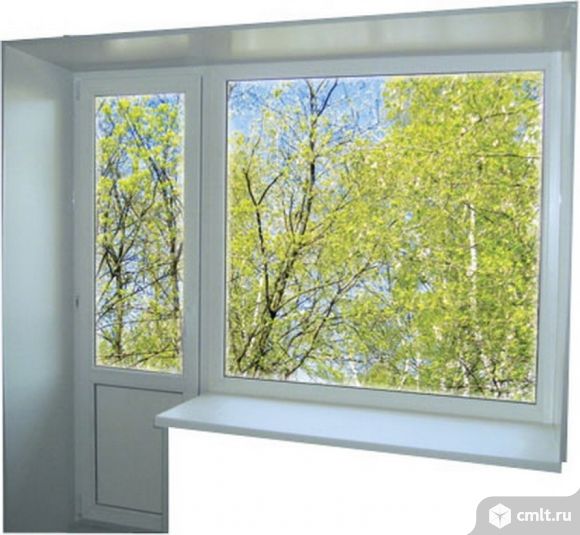 Блок балконный пластиковый: дверь 700х2100 мм. Фото 1.