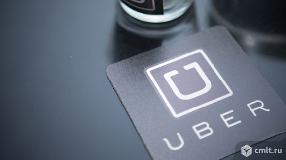 Водитель в такси UBER.. Фото 1.