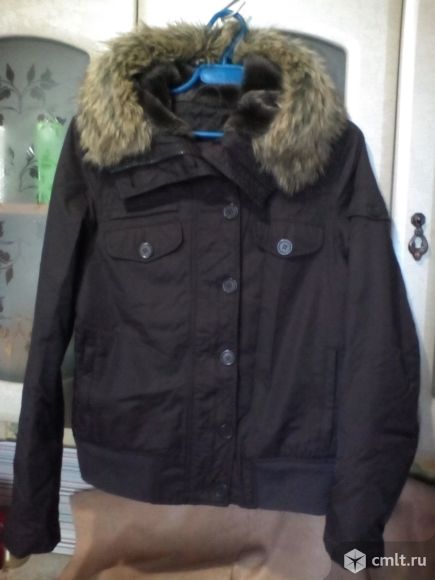 Продам куртку непромокаемую  утепленную с капюшоном. Фото 1.