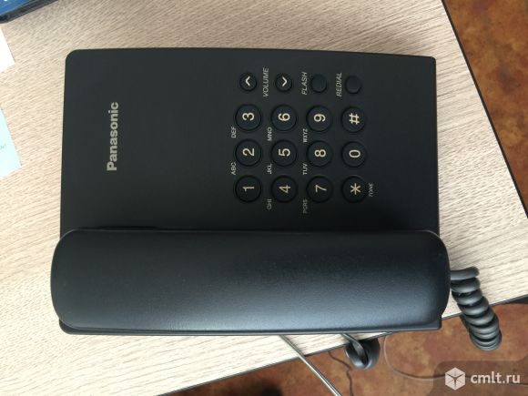 Телефон Panasonic KX-TS2350RU. Фото 1.