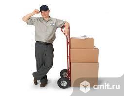 Грузчик-упаковщик. Фото 1.