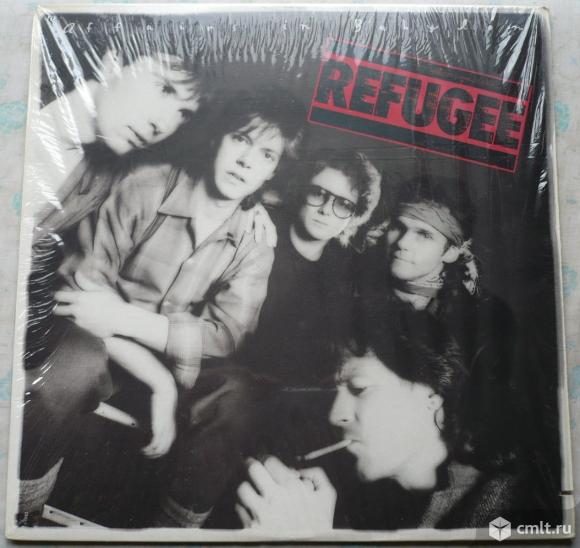 Грампластинка (винил). Гигант [12" LP]. Refugee. Affairs In Babylon. (C)(P) 1985 Chrysalis Records.. Фото 1.