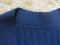 Школьная трикотажная жилетка на пуговицах для девочки темно-синяя (шерсть, синтетика) хорошо тянется. Фото 3.