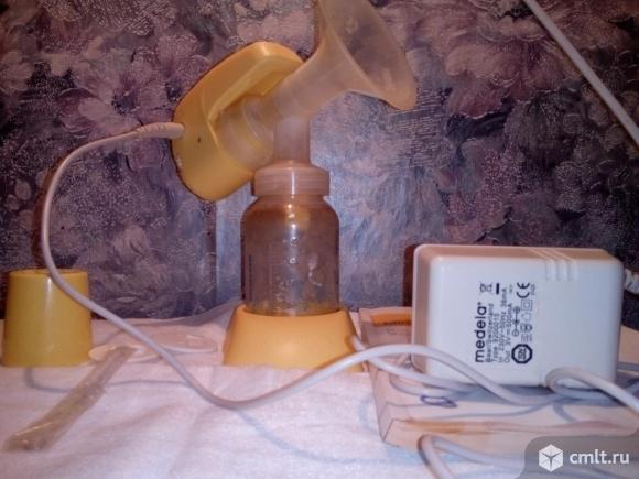 Молокоотсос электрический Medela mini electric. Фото 1.