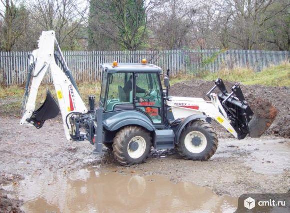 Экскаватор-погрузчик TEREX-970, гидромолот, вилы, ковши 30, 40, 60, 80 см. Челюстной, 1.3 куб.м. Фото 1.