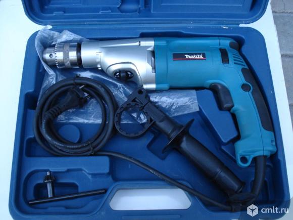 Дрель ударная makita HP2070. Фото 1.