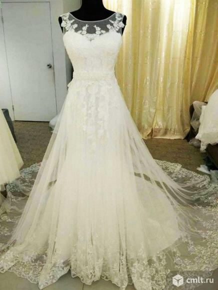 Свадебное платье со шлейфом. Фото 1.