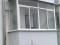 Алюминиевыеми белыми конструкциями балкон или лоджию остеклим.. Фото 1.