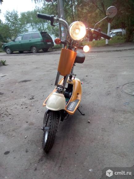 Электроскутер. Фото 6.