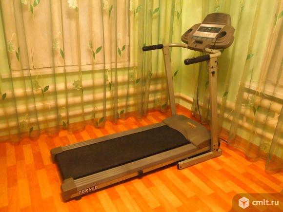 Электрическая Беговая дорожка torneo Linia T-203. Фото 1.