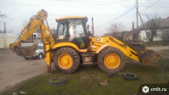 Погрузчик-экскаватор, гидромолот, автовышка, манипулятор услуги.. Фото 1.