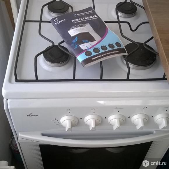Новая газовая плита Flama RG 24019 W в упаковке. Фото 1.