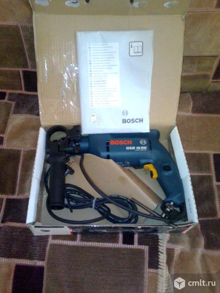 Дрель ударная BOSCH Новая. С хранения.  BOSCH GSB 16RE.. Фото 1.
