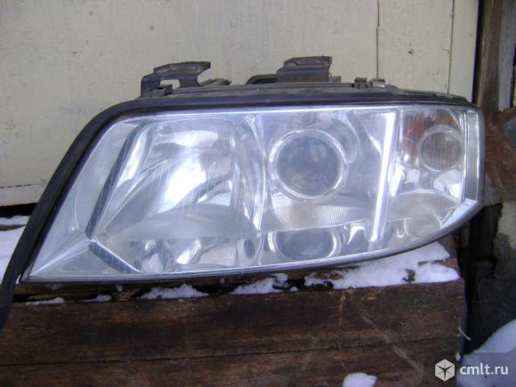 Для Ауди-А6 фара, левая, б/у, HELLA. Фото 1.