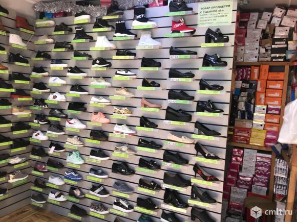 Продавец обуви на Машмет. Фото 3.