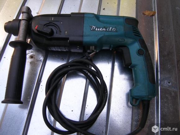 Макита воронеж. Перфоратор Makita hr2450. Дрель перфоратор Makita 2450. Перфоратор и дрел 2 в1 Макита. Кнопка перфоратора Makita 2450.