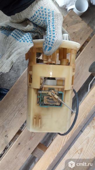 Насос топливный Ниссан Альмера Классик Б10 1704095F0B, 2751031100