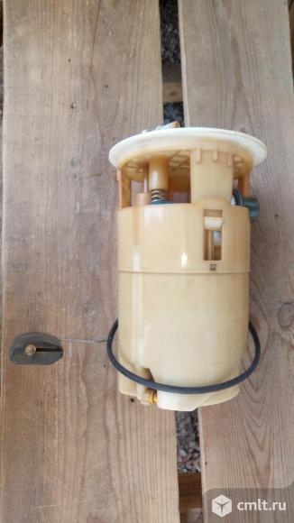 Насос топливный Ниссан Альмера Классик Б10 1704095F0B, 2751031100