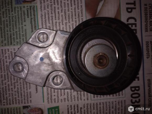 Натяжитель ролик натяжной ремня ГРМ  Daewoo. Фото 1.