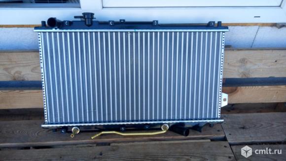 Радиатор охлаждения 0K2A115200E Кия Спектра. Фото 1.