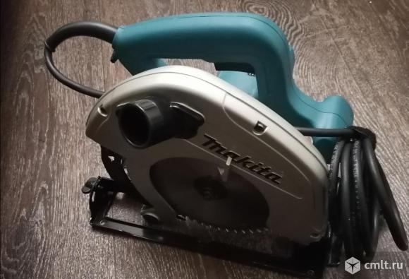 Пила дисковая Makita 5704r. Фото 1.