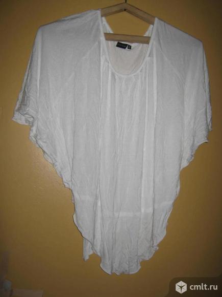 Белая трикотажная блузка. Фото 1.
