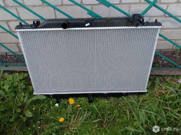 Радиатор охлаждения Мазда сх-5 PE0115200. Фото 1.