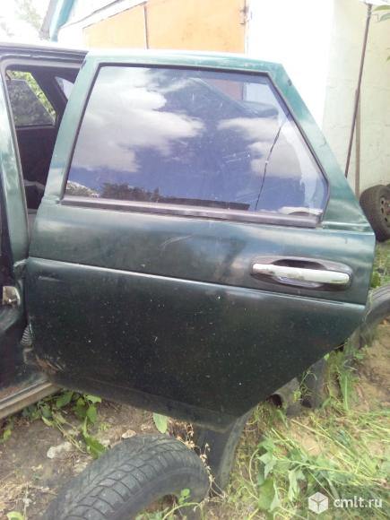 Дверь левая задняя всборе. Фото 1.