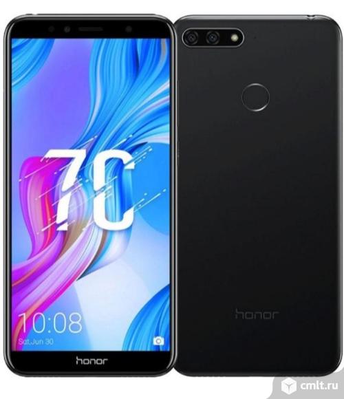 Оригинальный NFC 5.7" смартфон Honor 7C 3/32 Гб с новым чехлом книжкой. Фото 1.