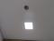 Натяжной потолок матовый в туалете с точечными светильниками . Компания Пазл
