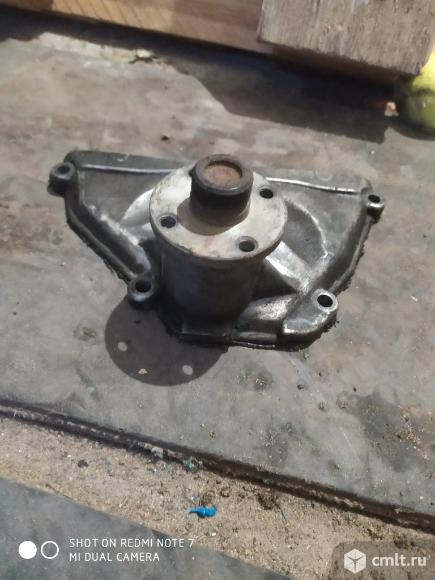 Передняя крышка гбц змз 409 под крыльчатку. Фото 1.