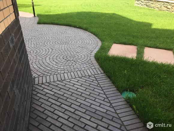 Укладка тротуарной плитки. Фото 1.