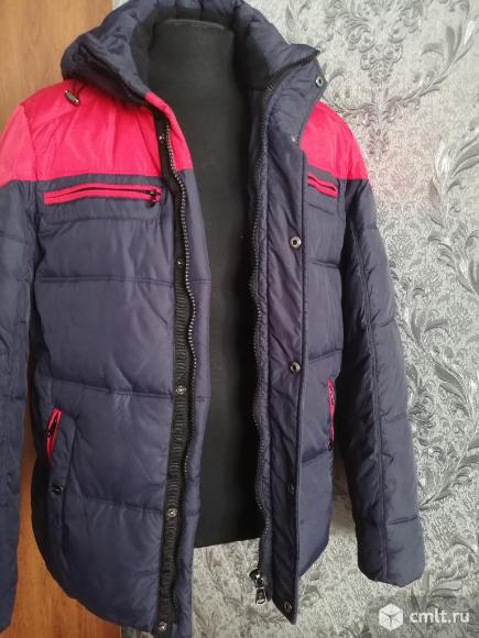 Отличный зимний пуховик. Фото 7.