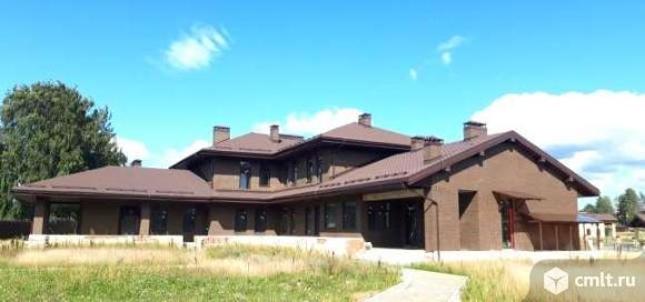 Дом площадью 1364.8 кв.м на участке 80 соток. Фото 1.