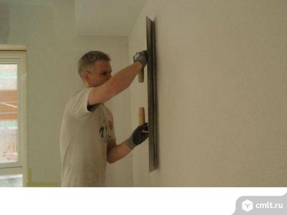 Облицовщик плиткой. Фото 1.