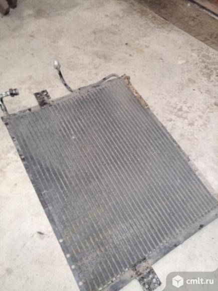 Радиатор кондиционера для Киа спортейдж 1. Фото 1.