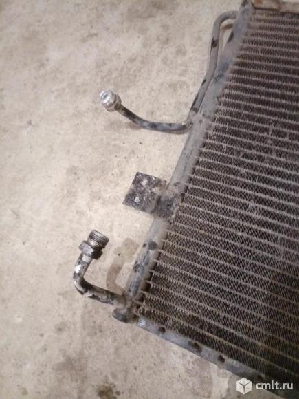 Радиатор кондиционера для Киа спортейдж 1. Фото 2.