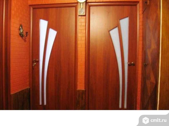 Установщик дверей. Фото 1.