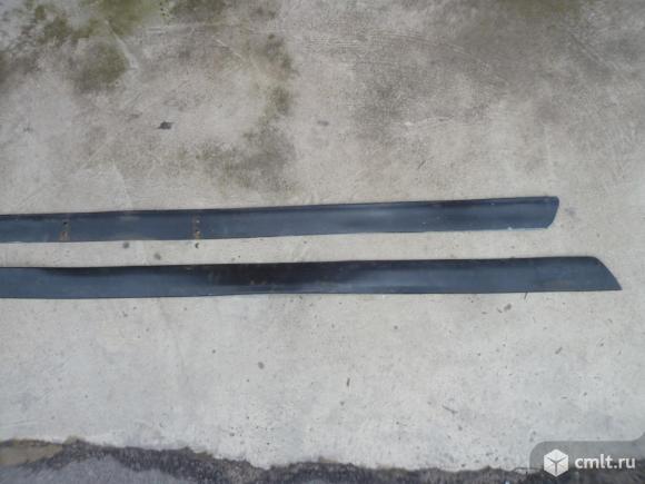 Резиновая накладка бампера Волга Газ 3110-31105. Фото 1.