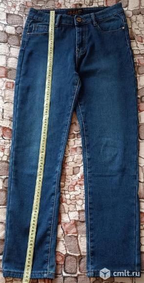 Джинсы утеплённые женские. Фото 1.
