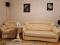 Двухместный диван и кресло из экокожи. Фото 1.