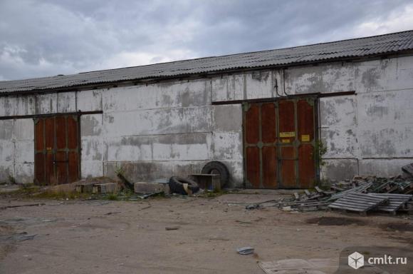 Здание склада запчастей и оборудования для строительных машин. Фото 1.