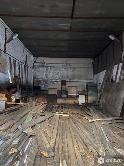 Здание склада запчастей и оборудования для строительных машин. Фото 4.