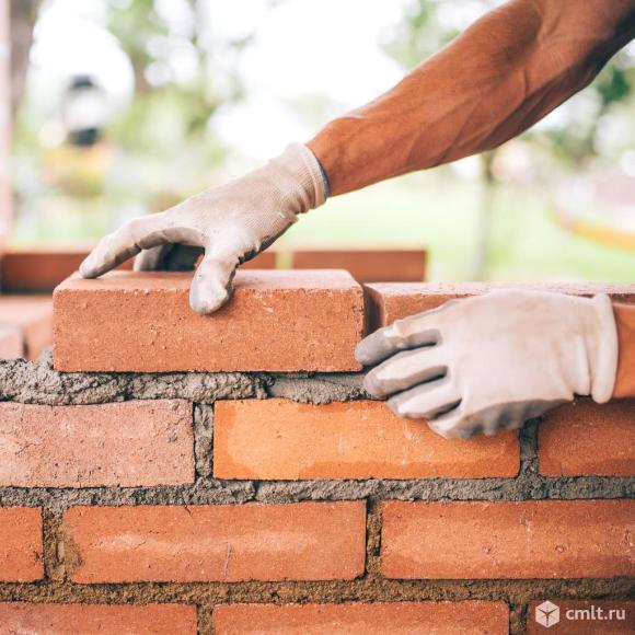 Каменщики или бригада каменщиков в организицию. Фото 1.