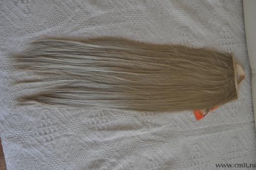 Шиньон и волосы на заколках. Фото 2.