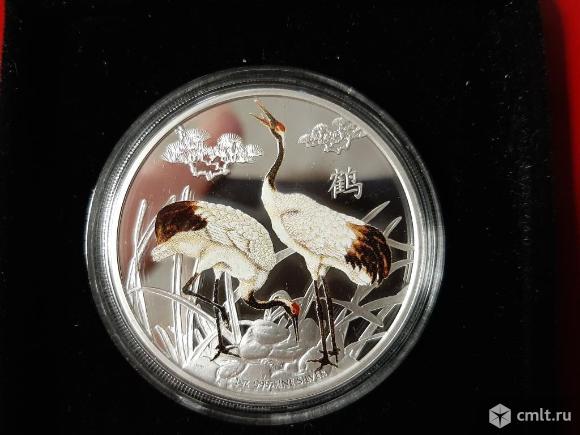 Серебряная монета серии Фен-Шуй. Фото 1.